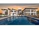 Expansive modern home with a large pool, spacious patio, and contemporary architectural style at 16856 N Mountain Pkwy, Fountain Hills, AZ 85268