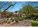 Serene landscaping featuring native plants surrounding a charming community building at 16856 N Mountain Pkwy, Fountain Hills, AZ 85268