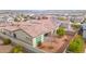 Backyard aerial view showing the patio and desert landscaping at 18059 W Tanglewood Dr, Goodyear, AZ 85338