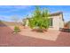 View of the backyard and lush lemon tree at 18059 W Tanglewood Dr, Goodyear, AZ 85338