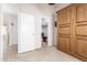 Bedroom featuring a built-in murphy bed and a closet for versatile use of space at 20615 N 105Th Ave, Peoria, AZ 85382
