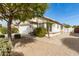 Well-maintained home with neutral colors, desert landscaping, and a two-car garage at 20615 N 105Th Ave, Peoria, AZ 85382