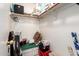 Walk-in closet providing ample storage space for personal items and household goods at 20615 N 105Th Ave, Peoria, AZ 85382