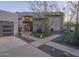 Striking home exterior with desert landscaping, modern design, and a spacious driveway at 2229 E State Ave, Phoenix, AZ 85020