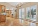 Bright and airy kitchen area featuring hardwood floors, stainless steel appliances and natural light at 2231 E Orangewood Ave, Phoenix, AZ 85020