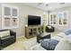 Bright living room with plantation shutters and comfortable seating at 2477 W Market Pl # 18, Chandler, AZ 85248