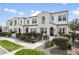 Charming townhome with neat landscaping and a welcoming facade on a sunny day at 2477 W Market Pl # 18, Chandler, AZ 85248