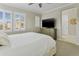 Bedroom featuring plantation shutters at 2477 W Market Pl # 18, Chandler, AZ 85248