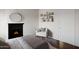 Bedroom featuring fireplace and shelving at 2561 E Toledo Ct, Gilbert, AZ 85295