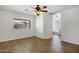 Bright bedroom with herringbone floors and a view of the backyard at 2561 E Toledo Ct, Gilbert, AZ 85295