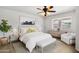 Stylishly decorated bedroom with a comfortable bed, modern furniture, and ample natural light at 2561 E Toledo Ct, Gilbert, AZ 85295