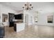 Bright open-plan kitchen featuring black cabinets, granite countertops, and plenty of space at 2561 E Toledo Ct, Gilbert, AZ 85295