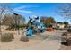 Community park featuring a blue playset with slides and climbing features at 2561 E Toledo Ct, Gilbert, AZ 85295