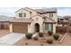 Beautiful two-story home with a two-car garage, solar panels and desert landscaping at 25916 N 161St Ave, Surprise, AZ 85387