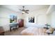 Bright bedroom with mountain views, a decorative desk and a comfy bed at 3168 S Yaqui Ln, Gold Canyon, AZ 85118