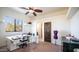 Bright craft room featuring a large workstation, natural light, and neutral color palette at 3168 S Yaqui Ln, Gold Canyon, AZ 85118