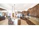 Modern kitchen with granite countertops, stainless steel appliances, and breakfast bar seating at 3168 S Yaqui Ln, Gold Canyon, AZ 85118
