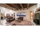 Open floor plan with leather seating, dining area, and stunning mountain views at 3168 S Yaqui Ln, Gold Canyon, AZ 85118