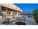 Inviting outdoor living space with a cozy fire pit and poolside lounging at 3168 S Yaqui Ln, Gold Canyon, AZ 85118