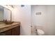 Stylish powder room featuring a vessel sink on a granite countertop and modern fixtures at 3168 S Yaqui Ln, Gold Canyon, AZ 85118
