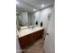 Cozy bathroom featuring a sink, vanity, and ample cabinet space for all your storage needs at 3228 W Glendale Ave # 103, Phoenix, AZ 85051