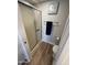 Bathroom featuring a shower with glass door, toilet, and towel rack at 3228 W Glendale Ave # 103, Phoenix, AZ 85051