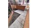 Small patio with tile and dirt area surrounded by stucco walls at 3228 W Glendale Ave # 103, Phoenix, AZ 85051