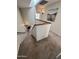 Carpeted staircase that showcases a modern railing with access to the living room and fireplace at 3228 W Glendale Ave # 103, Phoenix, AZ 85051