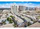 Panoramic aerial view of the townhome community with city skyline views in the background at 3633 N 3Rd Ave # 2016, Phoenix, AZ 85013