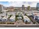 Aerial view of the townhome community surrounded by city buildings and landscape at 3633 N 3Rd Ave # 2016, Phoenix, AZ 85013