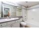 Well-lit bathroom featuring a tub and shower combination, a vanity with a sink, and a toilet at 3633 N 3Rd Ave # 2016, Phoenix, AZ 85013