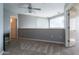 Spacious carpeted bedroom with natural light and ceiling fan at 3633 N 3Rd Ave # 2016, Phoenix, AZ 85013