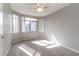 Serene bedroom with plush carpeting, ample natural light and a ceiling fan at 3633 N 3Rd Ave # 2016, Phoenix, AZ 85013