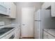 Kitchen with stainless steel appliances, marble countertops, and white cabinets at 3633 N 3Rd Ave # 2016, Phoenix, AZ 85013