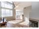 Bright living room features hardwood floors, fireplace and abundant natural light through large windows at 3633 N 3Rd Ave # 2016, Phoenix, AZ 85013