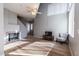 Bright living room features hardwood floors, fireplace, ceiling fan, and ample natural light at 3633 N 3Rd Ave # 2016, Phoenix, AZ 85013