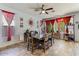 Bright dining room with a large table and ample natural light at 40255 N Faith Ln, Anthem, AZ 85086