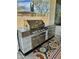 Outdoor stainless steel BBQ with colorful rug at 4116 E Sierra Sunset Trl, Cave Creek, AZ 85331