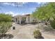Rear of home featuring an exterior patio, landscape and peaceful desert backyard at 4116 E Sierra Sunset Trl, Cave Creek, AZ 85331