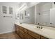 Well-lit bathroom features a double sink vanity and shower at 4116 E Sierra Sunset Trl, Cave Creek, AZ 85331