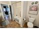 Bathroom with tiled floors, white tub and toilet at 4116 E Sierra Sunset Trl, Cave Creek, AZ 85331