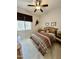 Bedroom with carpet, ceiling fan, and two windows at 4116 E Sierra Sunset Trl, Cave Creek, AZ 85331