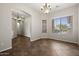 Dining room with tile flooring, a chandelier, and a bright window at 4116 E Sierra Sunset Trl, Cave Creek, AZ 85331