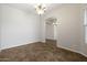 Bright dining room with a chandelier, neutral walls, and tile flooring at 4116 E Sierra Sunset Trl, Cave Creek, AZ 85331