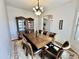 Elegant dining room with wooden table, seating for eight, and a decorative china cabinet at 4116 E Sierra Sunset Trl, Cave Creek, AZ 85331