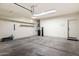 Three car garage with shelving, water heater and room for vehicles at 4116 E Sierra Sunset Trl, Cave Creek, AZ 85331