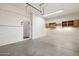 Clean three-car garage with shelving and ample room for parking at 4116 E Sierra Sunset Trl, Cave Creek, AZ 85331