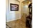 Hallway featuring tile flooring, neutral colored walls, and decorative accents at 4116 E Sierra Sunset Trl, Cave Creek, AZ 85331