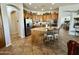 Spacious kitchen features a large island, stainless steel appliances, and custom wooden cabinetry at 4116 E Sierra Sunset Trl, Cave Creek, AZ 85331