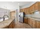 Open kitchen featuring granite countertops, a kitchen island with a sink, and stainless steel appliances at 4116 E Sierra Sunset Trl, Cave Creek, AZ 85331